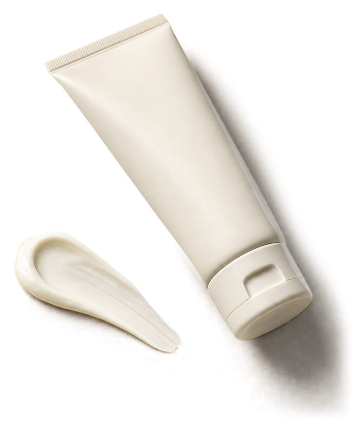 An unbranded moisturizer tube beside a cream swipe.